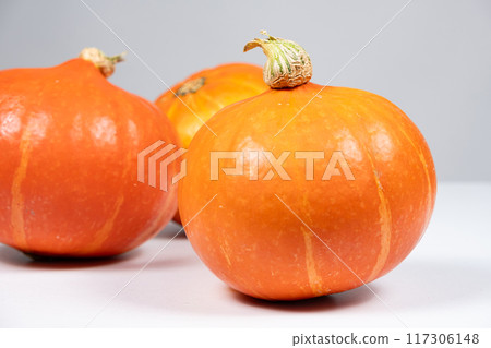 Hokkaido Pumpkins on White Background Hokkaido Pumpkins on White Background 117306148