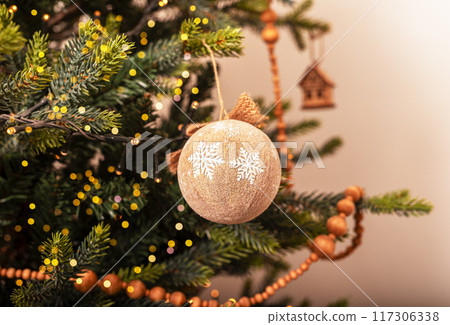 Christmas tree ball hanging on branch, sphere bauble, ornament Christmas tree ball hanging on branch, sphere bauble, ornament 117306338