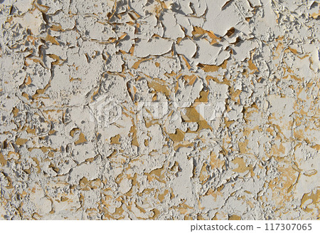 white peeling paint wall background, texture of a concrete old wall with stains and cracks 117307065