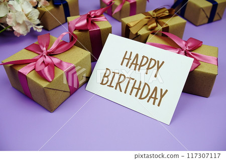 Happy Birthday card with gift box presents on purple background 117307117