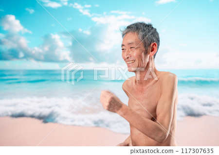 Elderly man having fun on the beach 117307635