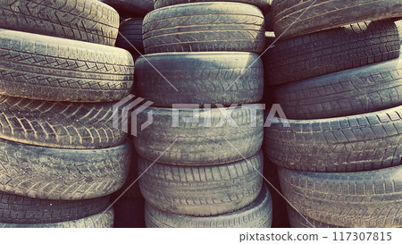 Pile of old used car tires outdoors Pile of old used car tires outdoors 117307815