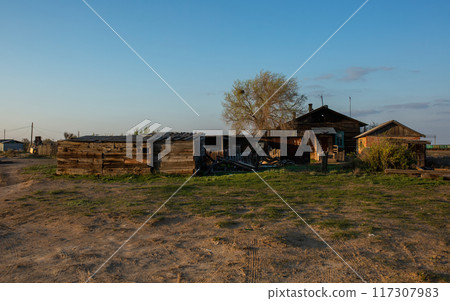 Farmstead, old wooden houses on Baskunchak. 117307983