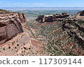 Scenic view in Colorado National Monument with city of Fruita in background. 117309144