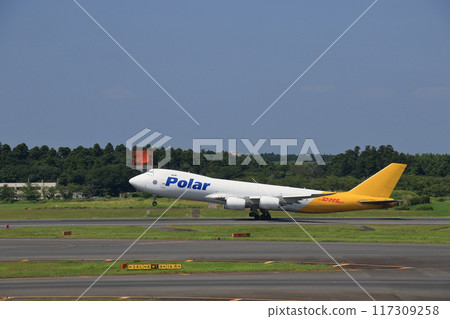 A large cargo plane taking off from Narita Airport 117309258
