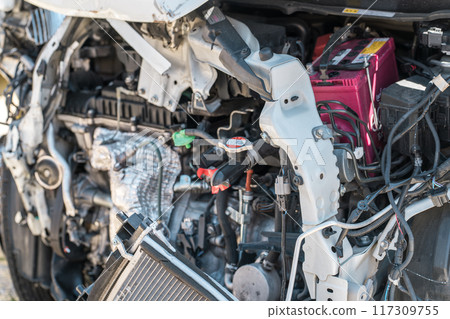 The engine room of a light vehicle involved in a traffic accident 117309755