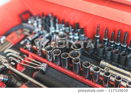 Tools in the auto mechanic's cabinet 117310630