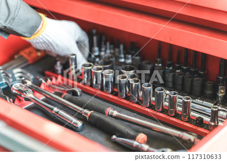 Tools in the auto mechanic's cabinet 117310633