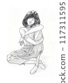 a young woman sitting hugging her knees on the floor for resting and feeling tired 117311595
