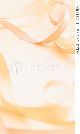 Pale orange ribbon background material 117311925