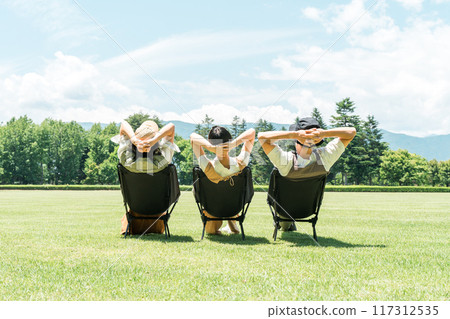 Parents and children/families chairing in parks and campsites Parents and children/families chairing in parks and campsites 117312535