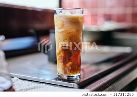 iced coffee with milk 117315296
