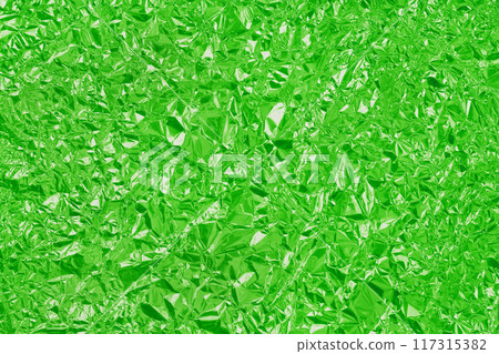Green lime foil shiny texture, abstract wrapping paper for background and design art work. 117315382