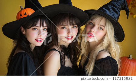 Three women dressed in Halloween costumes 117315921