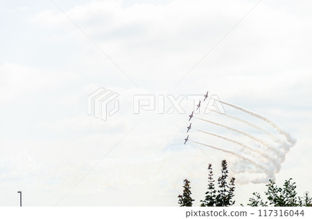A formation of five aircraft performing display and aerobatics 117316044