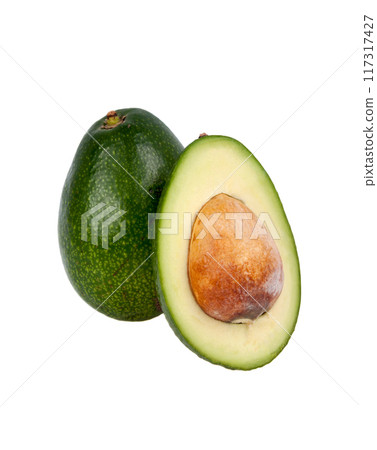 Fresh organic avocado isolated on the white. Tropical exotic food. Fresh organic avocado isolated on the white. Tropical exotic food. 117317427