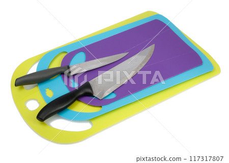 plastic kitchen cutting board with knife isolated on the white plastic kitchen cutting board with knife isolated on the white 117317807