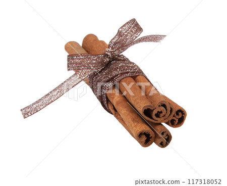Cinnamon sticks with ribbon isolated on the white 117318052