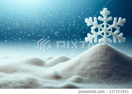 Small pile of white snow with snowflake on it. Gradient blue background implies wintry theme. Small pile of white snow with snowflake on it. Gradient blue background implies wintry theme. 117321451