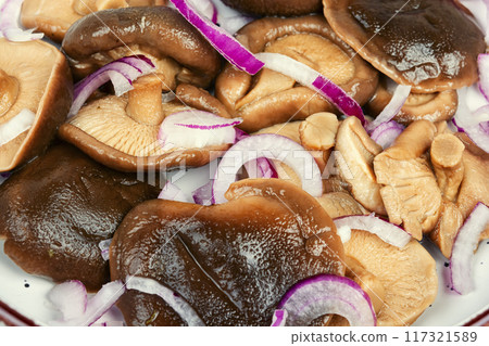 Close-up of marinated mushrooms 117321589