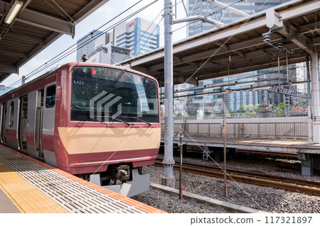 [Shinagawa Station] Red train on the Joban Line waiting to depart 117321897