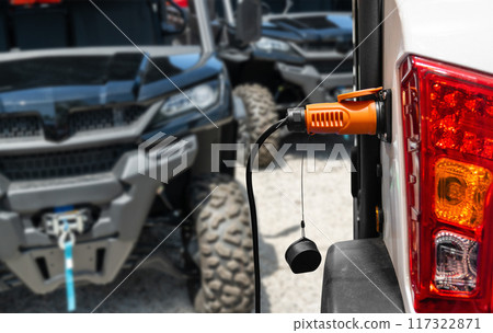 Electric ATV with connected charging cable 117322871