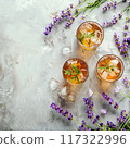 Lavender lemonade with ice cube on concrete backgrounds 117322996
