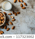 Almonds milk on concrete backgrounds, top view 117323002