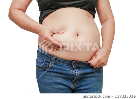 Asian woman show fat belly big size overweight and obesity isolated on white background with clipping path. Asian woman show fat belly big size overweight and obesity isolated on white background with clipping path. 117323339