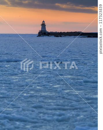 Lighthouse at Nemuro Port covered in drift ice / Nemuro, Japan Lighthouse at Nemuro Port covered in drift ice / Nemuro, Japan 117323839