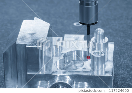 Closeup scene the CMM machine measuring the aluminum automotive parts. Closeup scene the CMM machine measuring the aluminum automotive parts. 117324600