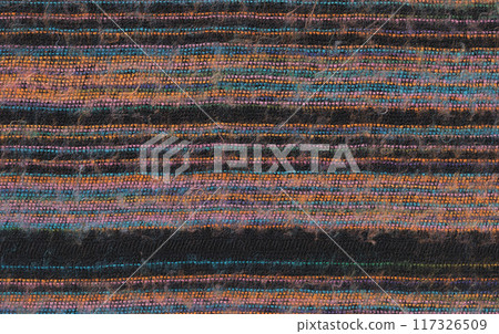 Nepalese textile background. Woven ethnic fabric texture Nepalese textile background. Woven ethnic fabric texture 117326509