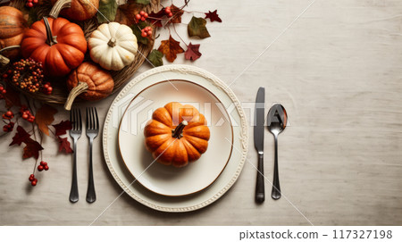 Thanksgiving Table Setting with Pumpkin 117327198
