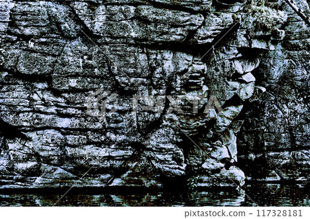 Stone gray black crumbling old rock formation nature background Stone gray black crumbling old rock formation nature background 117328181