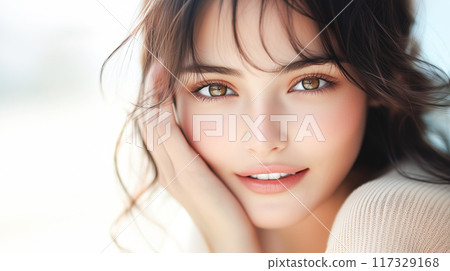 Smiling woman with glowing skin 117329168