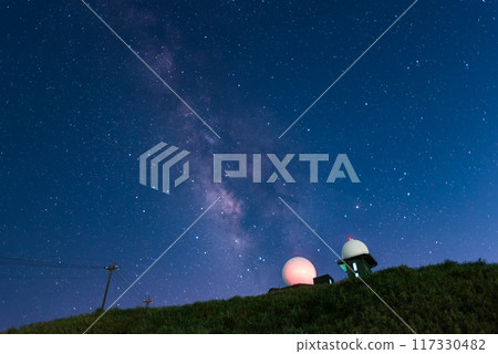 Meteorological Radar Station Against Starry Night and Galaxy. 117330482