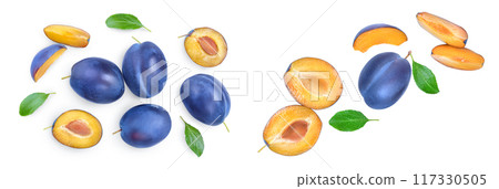 fresh plum and half with leaves isolated on white background. Top view. Flat lay 117330505