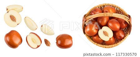 jujube or chinese date in a wicker basket isolated on white background . Top view with copy space for your text. Flat lay 117330570