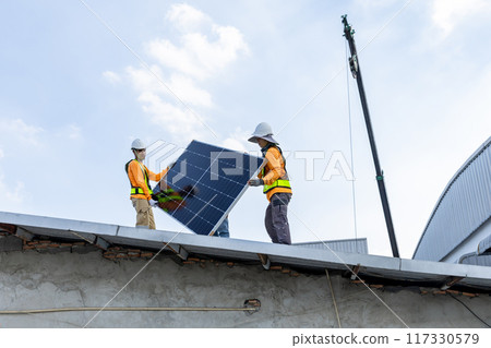 Technician worker on solar panels. 117330579