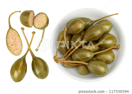 Capers in ceramic bowl isolated on white background. Pickled or canned capers. Top view with copy space for your text. Flat lay Capers in ceramic bowl isolated on white background. Pickled or canned capers. Top view with copy space for your text. Flat lay 117330594