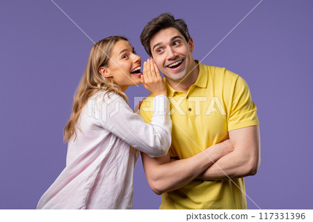 Gossiper woman whispers in boyfriends ear secret, rumors, gossips, violet studio Gossiper woman whispers in boyfriends ear secret, rumors, gossips, violet studio 117331396