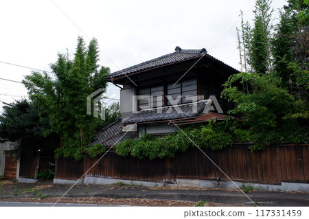 Abandoned house in a residential area 117331459
