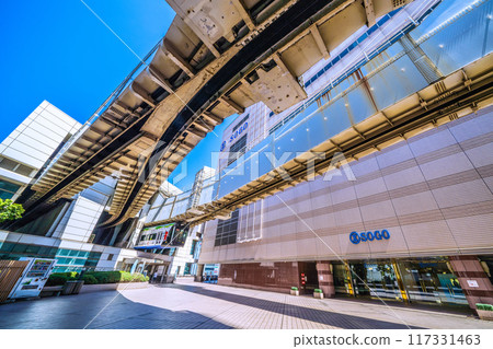 Chiba cityscape, Japan, August. View of the monorail leaving Chiba Station on the Chiba Urban Monorail. Chiba cityscape, Japan, August. View of the monorail leaving Chiba Station on the Chiba Urban Monorail. 117331463