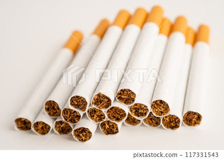 Cigarette on US dollar banknotes, cost, trading, marketing and production, No smoking, import export concept. 117331543