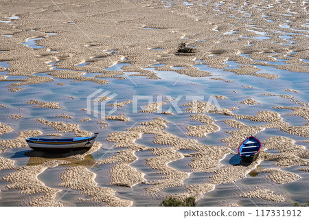 The beach of Cacela Velha in the Algarve region of southern Portugal. The beach of Cacela Velha in the Algarve region of southern Portugal. 117331912