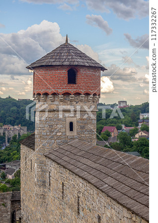 The ancient Kamyanets-Podilsky castle located in the historical city of Kamyanets-Podilsky, Ukraine. 117332267