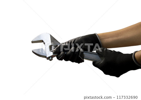 Mechanic holding a large adjustable wrench Size 375mm, white background 117332690