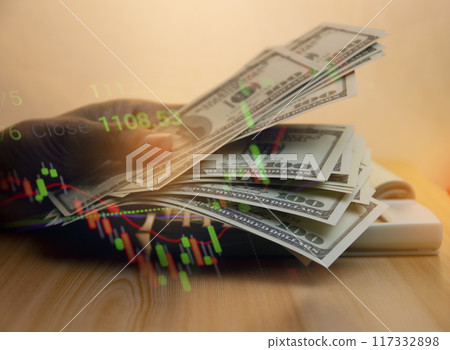 Business finance and investment with dollar banknote concept, Capital gain world money economic growth. financial graph chart invest on stock market, market report on cash currency concept Business finance and investment with dollar banknote concept, Capital gain world money economic growth. financial graph chart invest on stock market, market report on cash currency concept 117332898