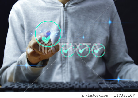 service guarantee, Validation concept for business process automation, quality assurance management, certification, digital transformation. businessman touching checked icon on virtual screen. 117333107