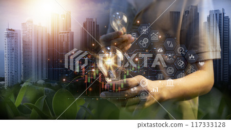 Business hand holding light bulb with business startup icon fast to the goal and achieve goal and solution concept. 117333128